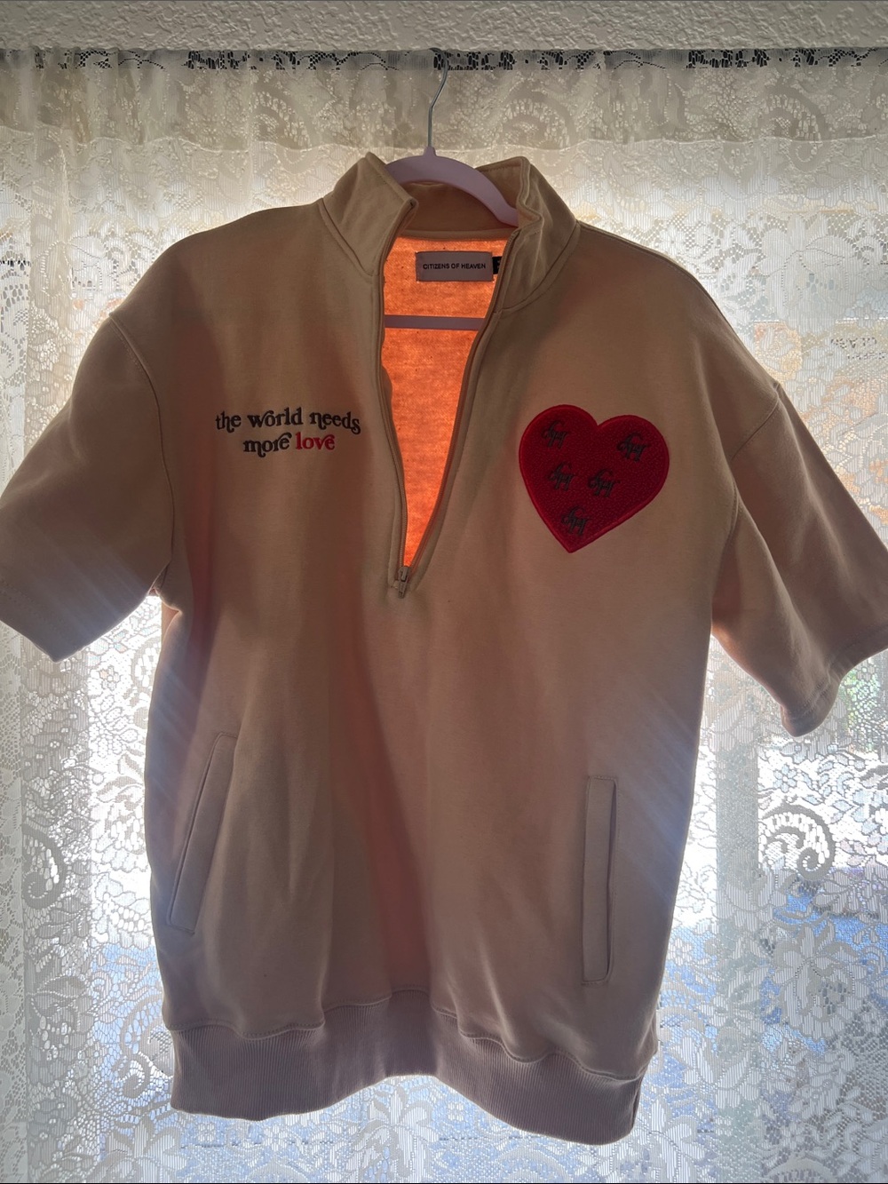 Cream Short-Sleeve Half-Zip Sweatshirt with Red Heart Patch